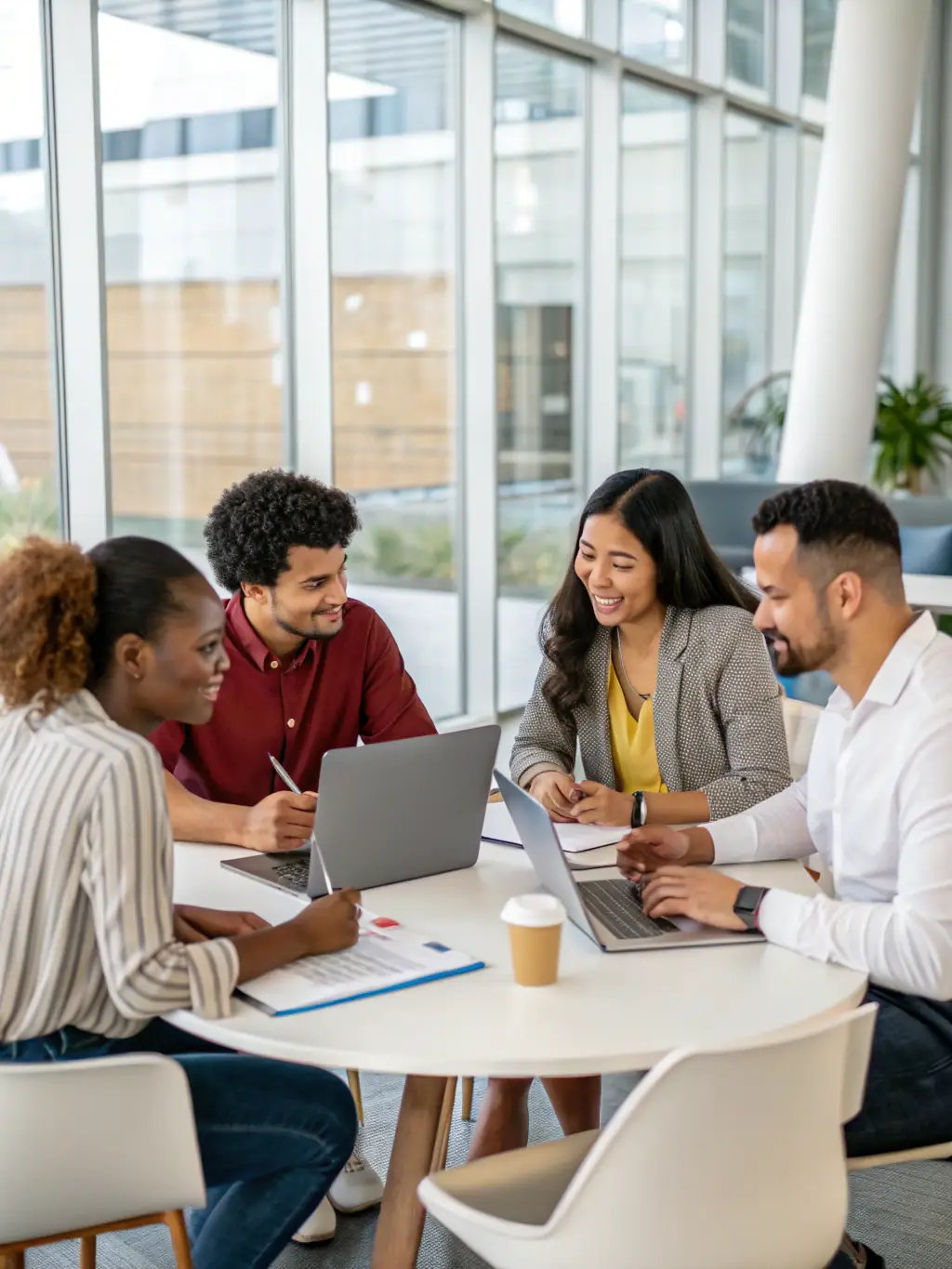 A diverse team brainstorming ideas around a table, representing collaborative problem-solving and innovative solutions.